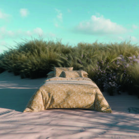 linge de lit aux tons naturels dans une ambiance estivale et sauvage