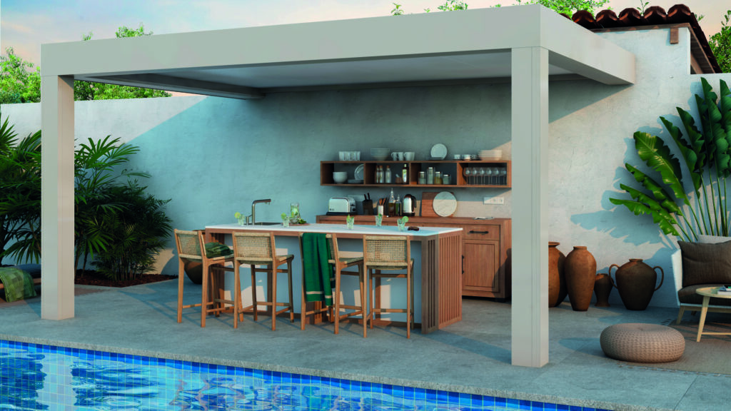 Pergola Batiman abritant une cuisine extérieure au bord d'une piscine